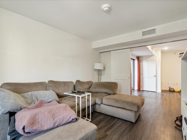 living room with dark wood-type flooring