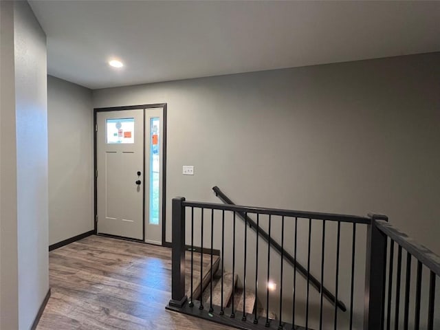 foyer entrance with light wood-type flooring