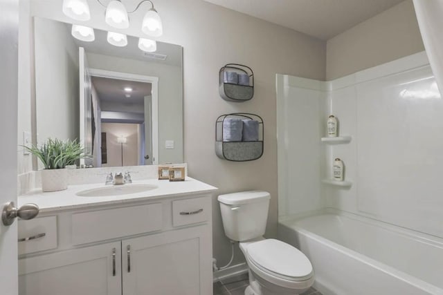 full bathroom featuring tile patterned floors, vanity, shower / bath combination, and toilet