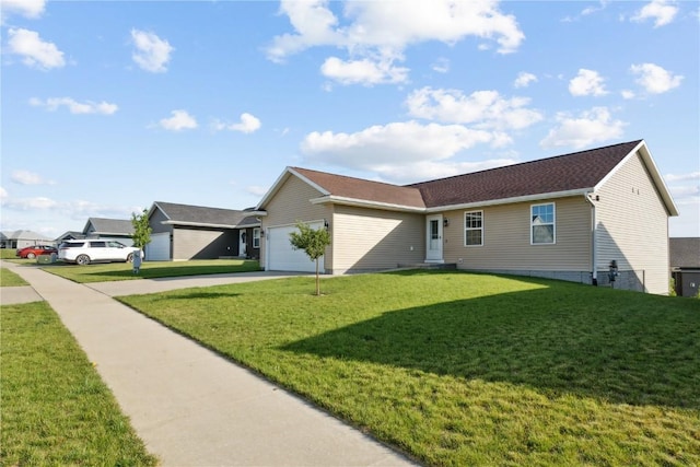 ranch-style home featuring a front yard and a garage