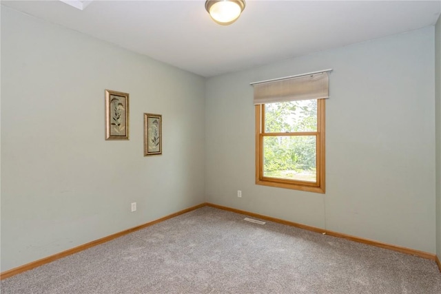 view of carpeted spare room