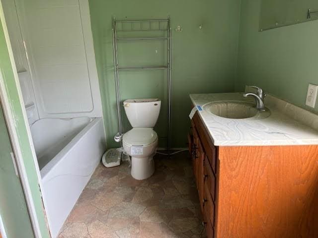 full bathroom with shower / bathing tub combination, vanity, and toilet