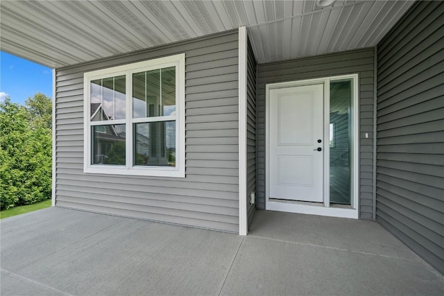 doorway to property featuring a patio