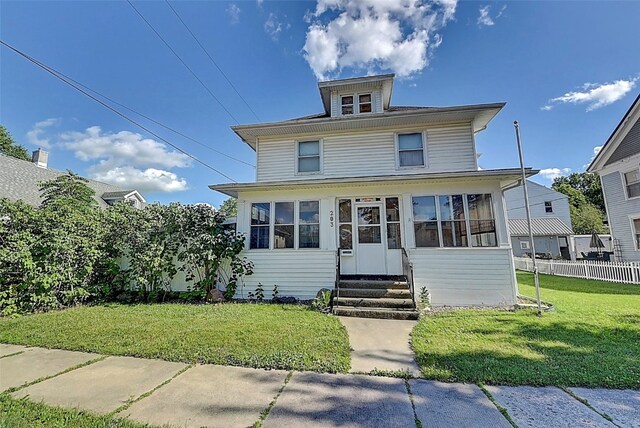 view of front facade featuring a front yard