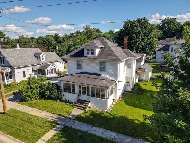 view of front of property with a front lawn