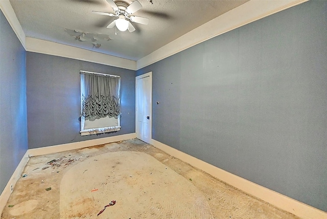 spare room featuring ceiling fan