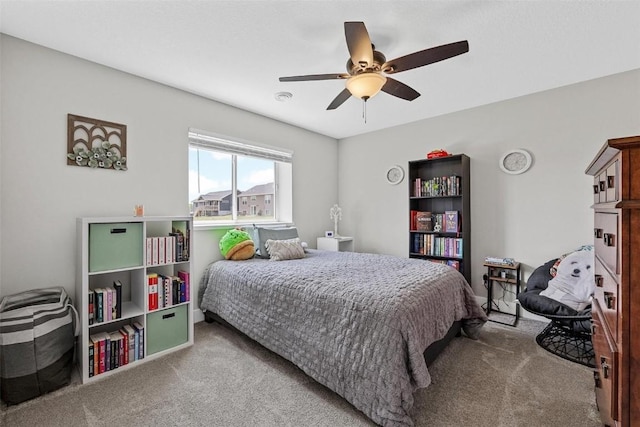 bedroom featuring a ceiling fan and carpet flooring