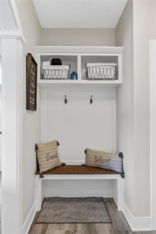 mudroom featuring hardwood / wood-style floors