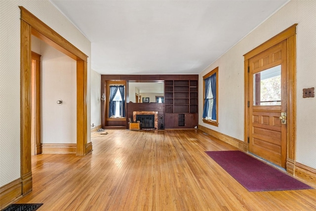 foyer entrance with light wood-type flooring