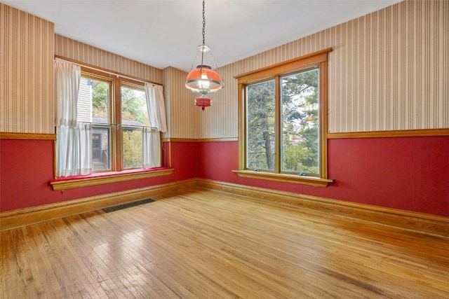 empty room featuring hardwood / wood-style floors