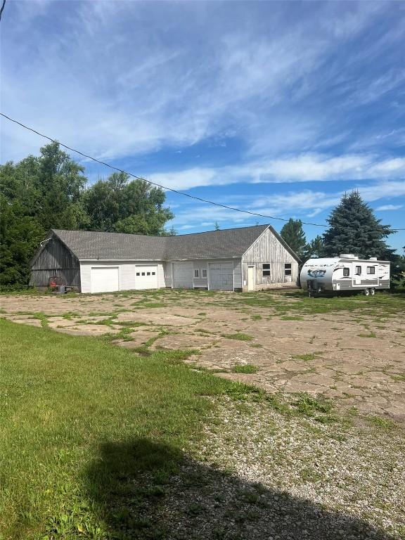 view of yard with a garage