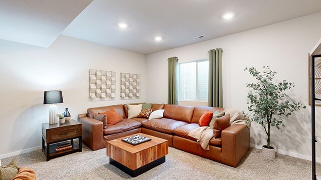 living room featuring light colored carpet