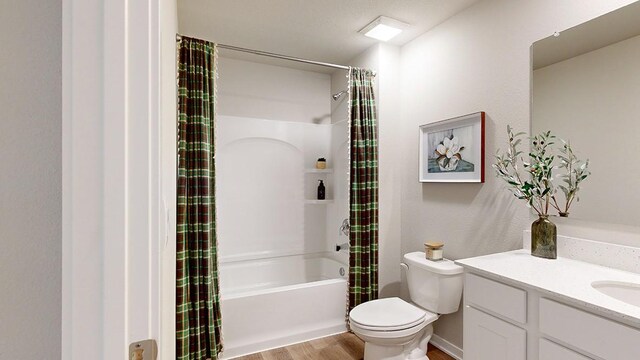 full bath with shower / bathtub combination with curtain, toilet, wood finished floors, and vanity