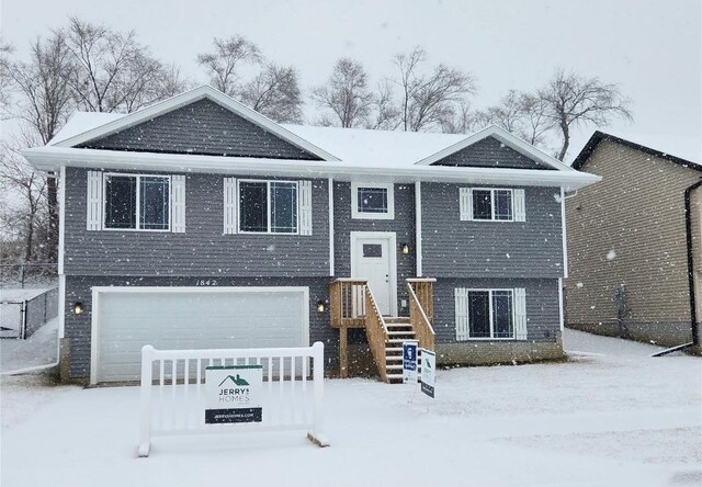 raised ranch with a garage