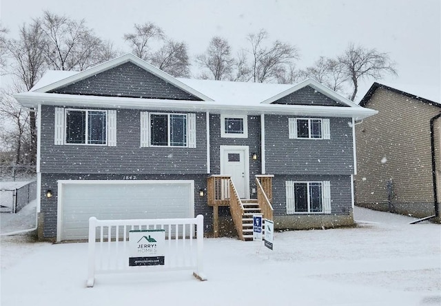 bi-level home with a garage