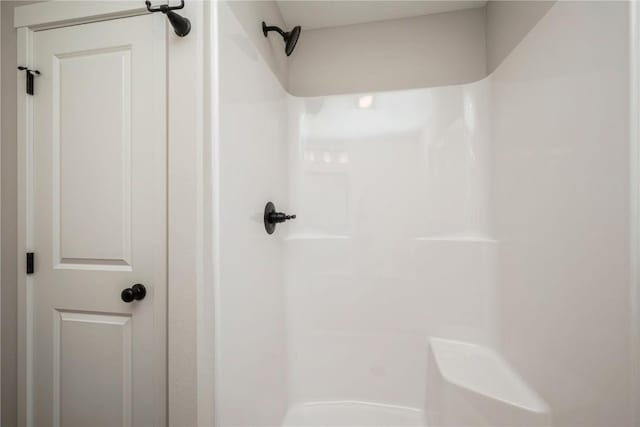 bathroom featuring walk in shower