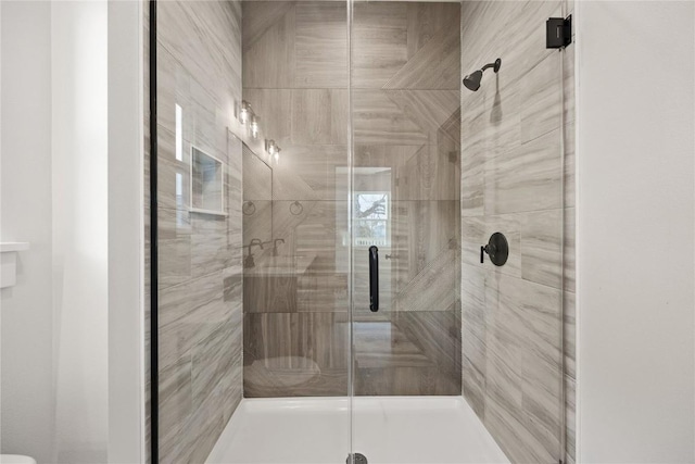 bathroom featuring walk in shower