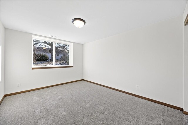 spare room with carpet floors