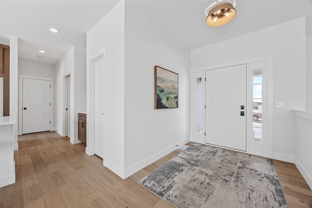 entrance foyer featuring light wood-type flooring