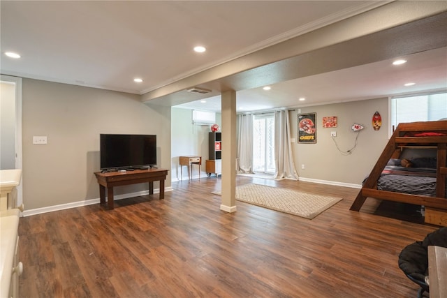 interior space featuring ornamental molding, dark hardwood / wood-style floors, and plenty of natural light