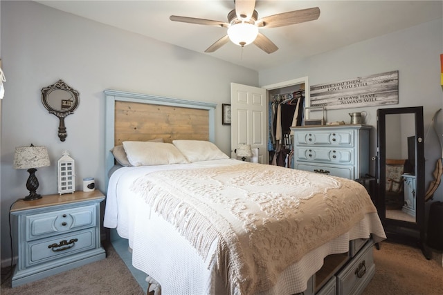 bedroom featuring a closet, dark carpet, and ceiling fan