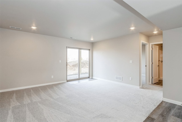 empty room with carpet floors