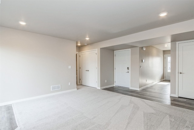 empty room featuring carpet floors