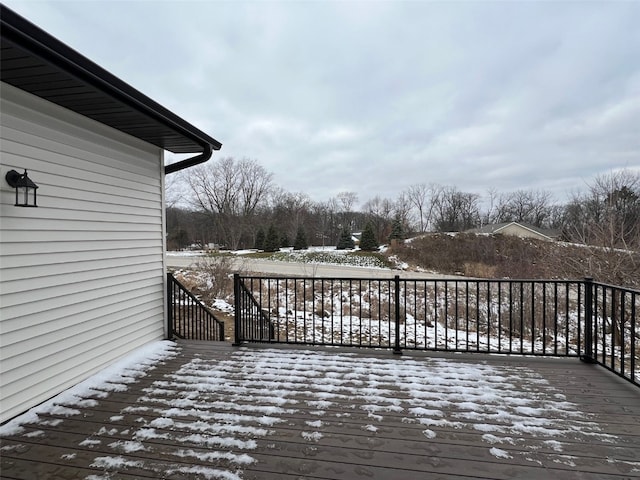 view of snow covered deck