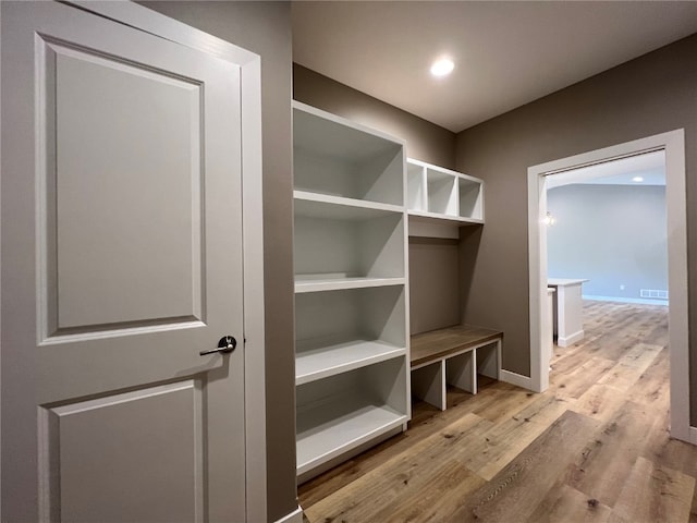 mudroom with light wood-type flooring