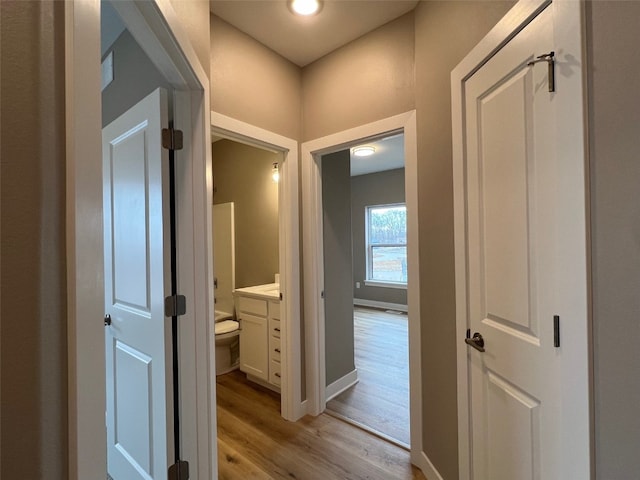 hall featuring light hardwood / wood-style flooring