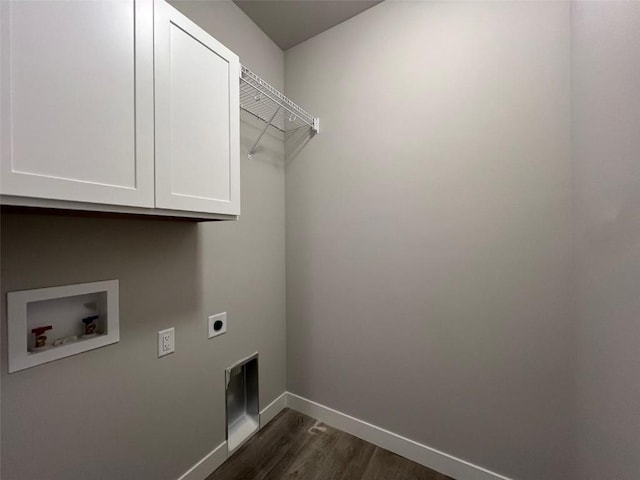 laundry room with cabinets, washer hookup, hookup for an electric dryer, and dark hardwood / wood-style flooring