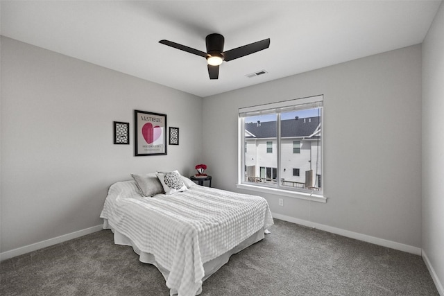 carpeted bedroom featuring ceiling fan