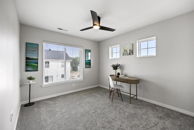 office with ceiling fan and carpet floors