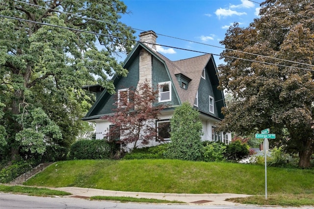 exterior space with a front lawn