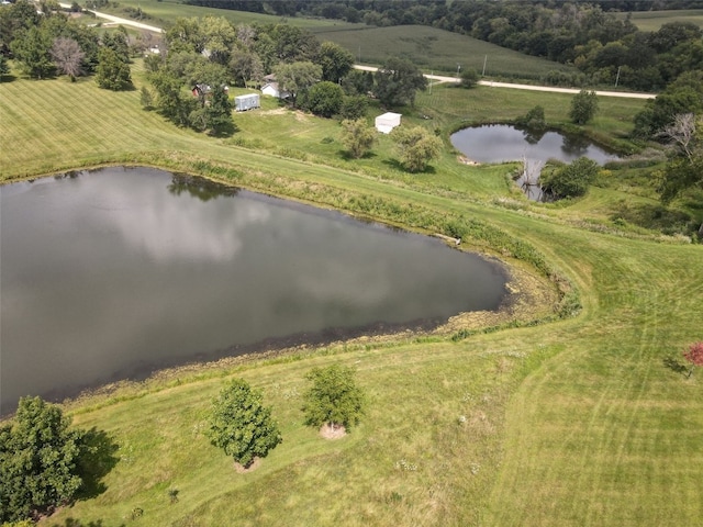 aerial view featuring a rural view and a water view