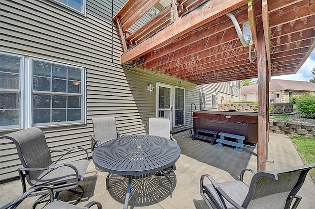 view of patio / terrace featuring a hot tub