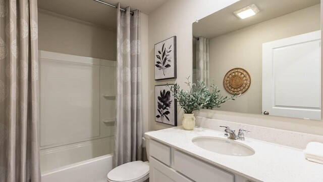 full bathroom with vanity, toilet, and shower / bathtub combination with curtain