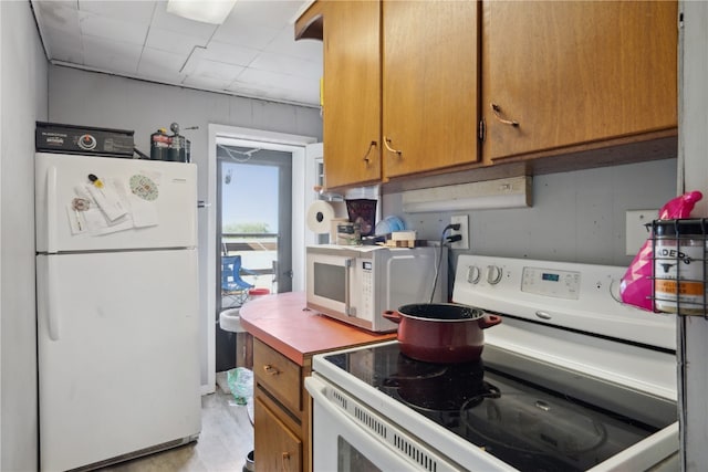 kitchen with refrigerator and range