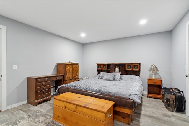 bedroom with light hardwood / wood-style flooring