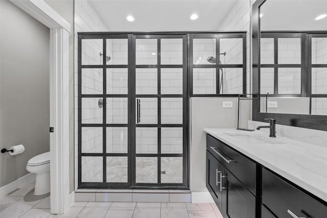 full bathroom featuring recessed lighting, vanity, and toilet