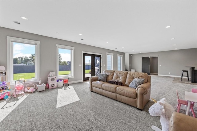 carpeted living room featuring french doors, recessed lighting, and baseboards