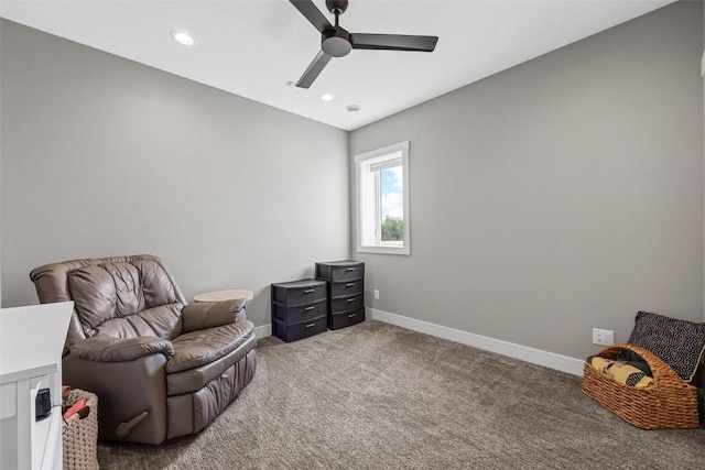 living area with a ceiling fan, recessed lighting, carpet flooring, and baseboards