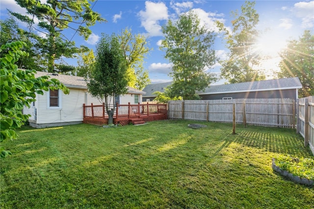 view of yard featuring a wooden deck