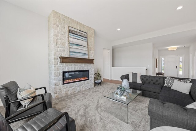 5638 Meadow Grass Cir SE, Cedar Rapids, IA 52403 - living area featuring a stone fireplace, baseboards, and recessed lighting