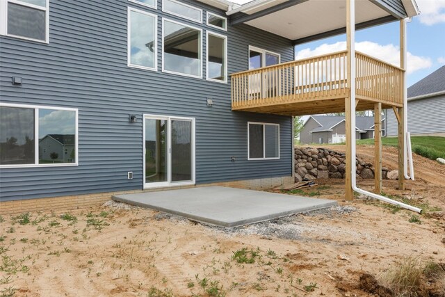5638 Meadow Grass Cir SE, Cedar Rapids, IA 52403 - back of house featuring a patio and a deck