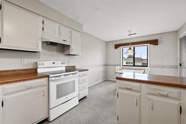 kitchen featuring white range with electric stovetop, white cabinets, butcher block counters, hanging light fixtures, and under cabinet range hood