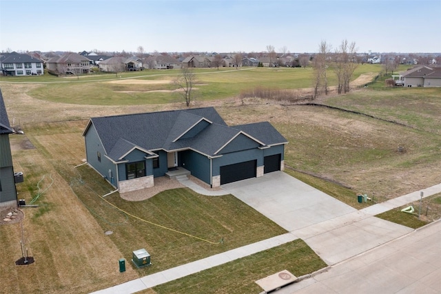 birds eye view of property with a residential view