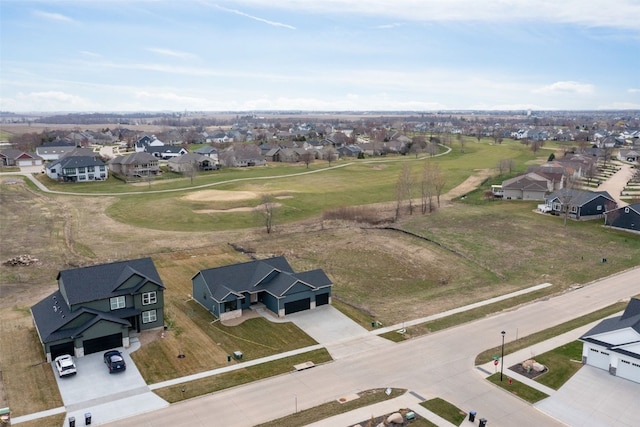 birds eye view of property with a residential view