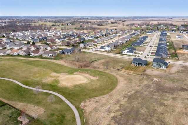 birds eye view of property featuring a residential view and view of golf course