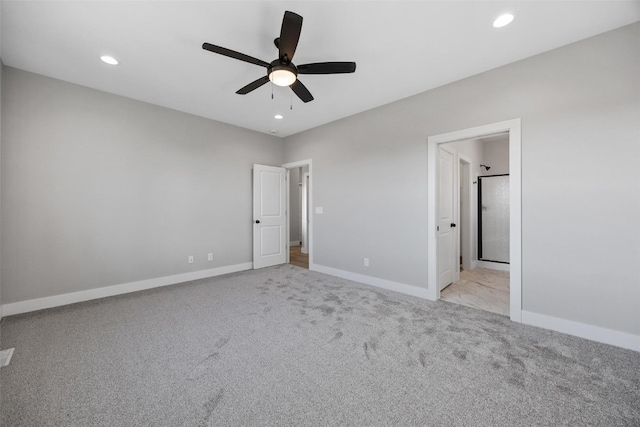 unfurnished bedroom featuring ceiling fan and light carpet